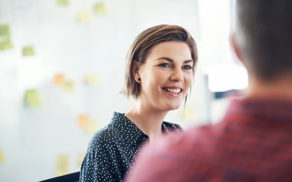 Female candidate talking to potential employer in an interview in interview