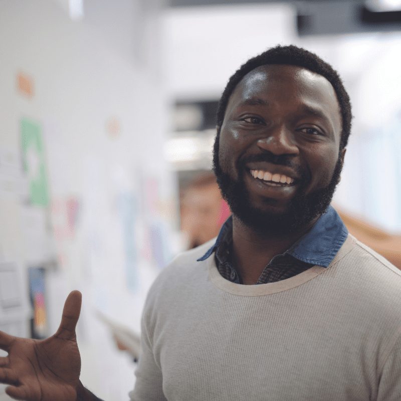 Man smiling at new temporary job in council